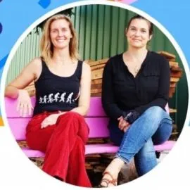 Kris and Shawna sitting on pink bench